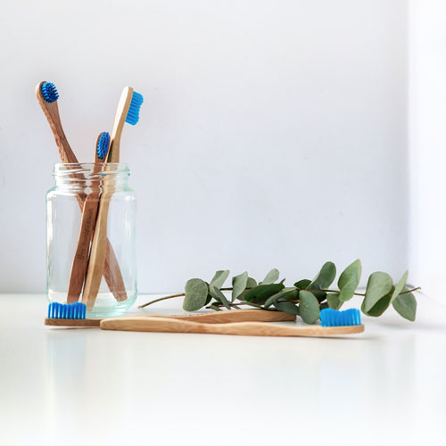 Toothbrushes photo on Unsplash.com