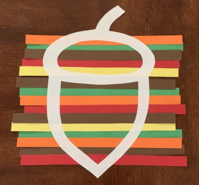 Glue the strips to the acorn in a pattern you like.