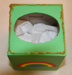 Paint the box green, decorate and line with tissue.