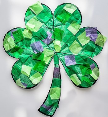 photo of a tissue paper shamrock. A scissor skills craft project for young children.