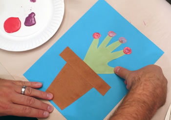 stamp flower centers with your thumb (or dad's!)