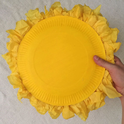 photo of the finished paper plate sunshine maraca craft